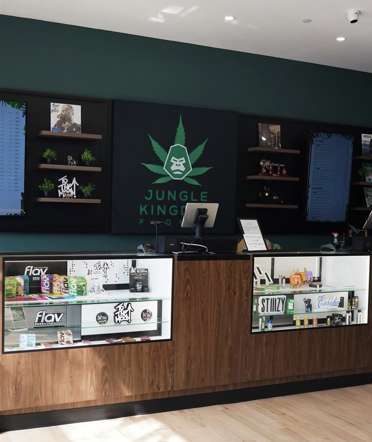 Customers browsing inside Jungle Kingdom Flower dispensary