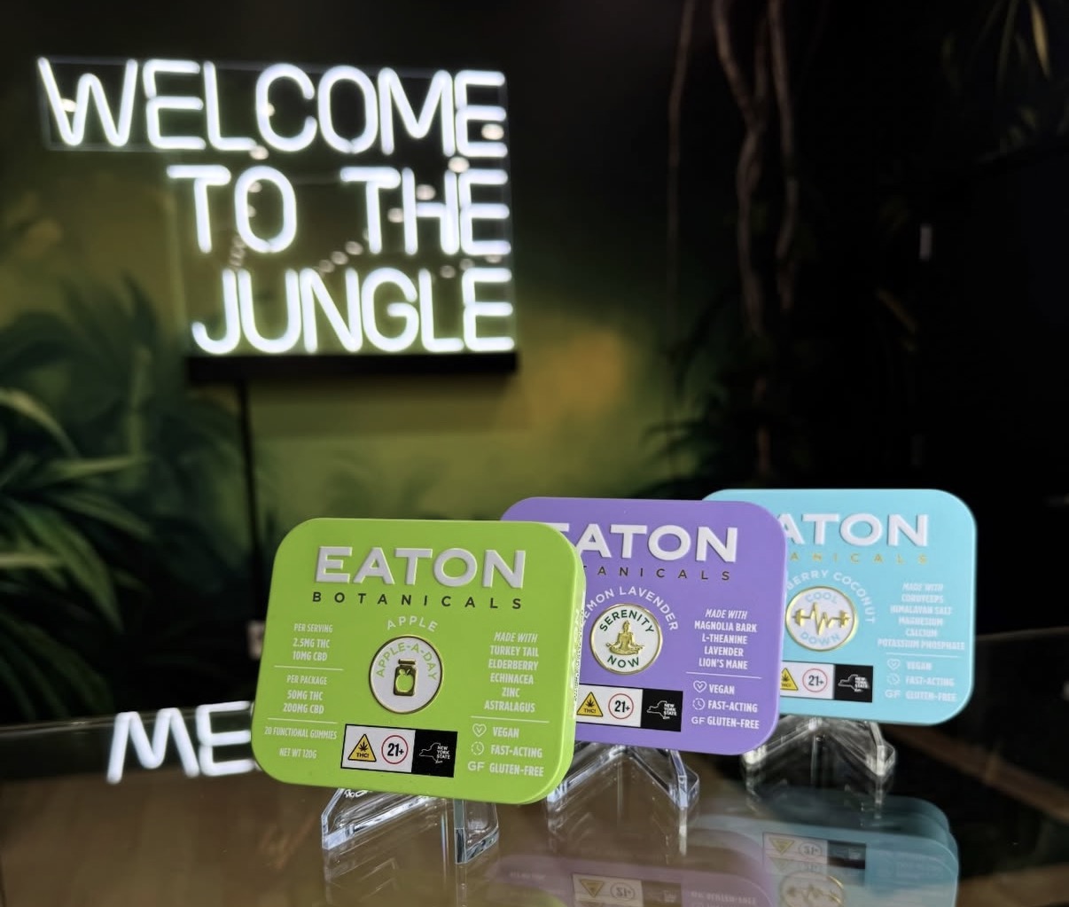 Welcome to the Jungle neon sign with cannabis products at Jungle Kingdom Flower